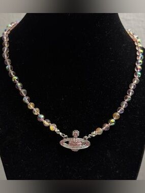 Vivienne Westwood necklace, featuring the brand's iconic Orb motif